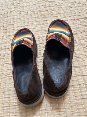 Ariat Brown Suede Slip-On Flats with Vibrant Serape Stripe